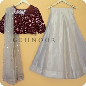NISA MAROON AND GOLD LEHENGA